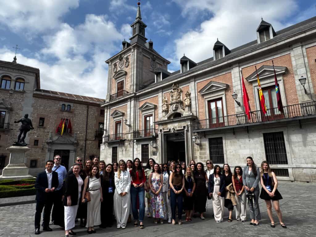 30 young leaders in front of Casa de la Villa, historic Madrid City Hall